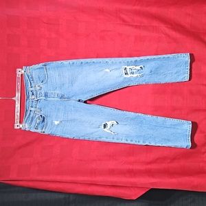 Levi's 501 button fly high-waisted distressed jeans